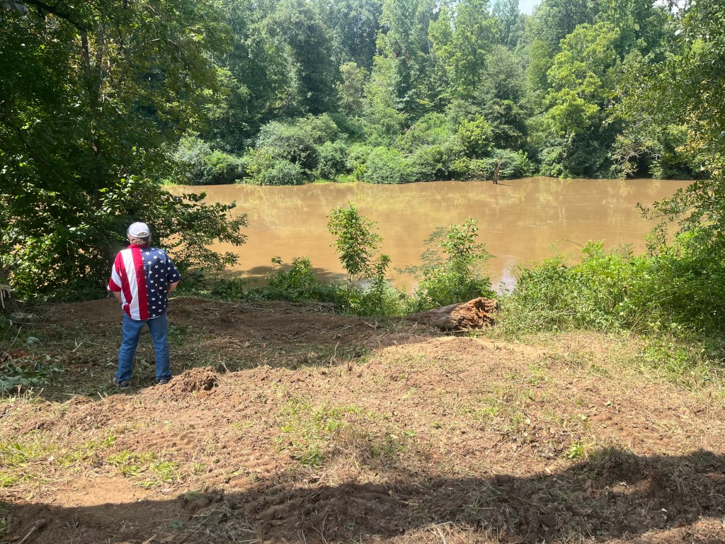 River view opened up after land clearing and brush removal.